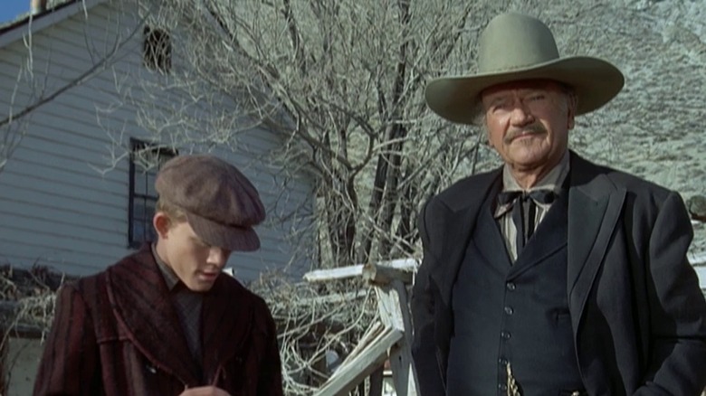 Ron Howard and John Wayne in The Shootist