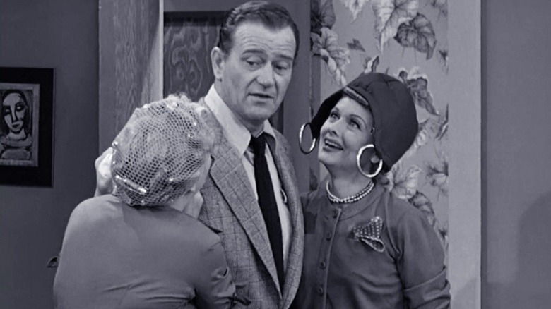 John Wayne looking wary opposite Lucille Ball as Lucy McGillicuddy Ricardo in I Love Lucy