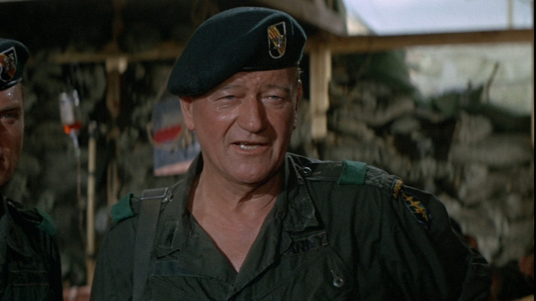 John Wayne as Col. Mike Kirby wearing a beret in The Green Berets