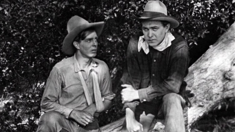 Harry Carey arm in Straight Shooting (1917)