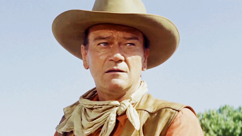 John Wayne's Capt. Jake Cutter is seen against a blue sky in The Commancheros
