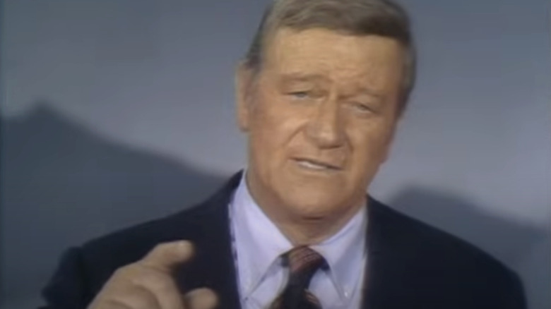 John Wayne looks into camera in Swing Out Sweet Land