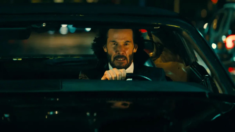Keanu Reeves Driving in John Wick: Chapter 4