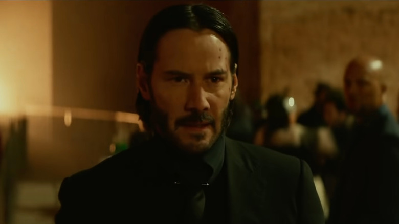 John Wick walking through club