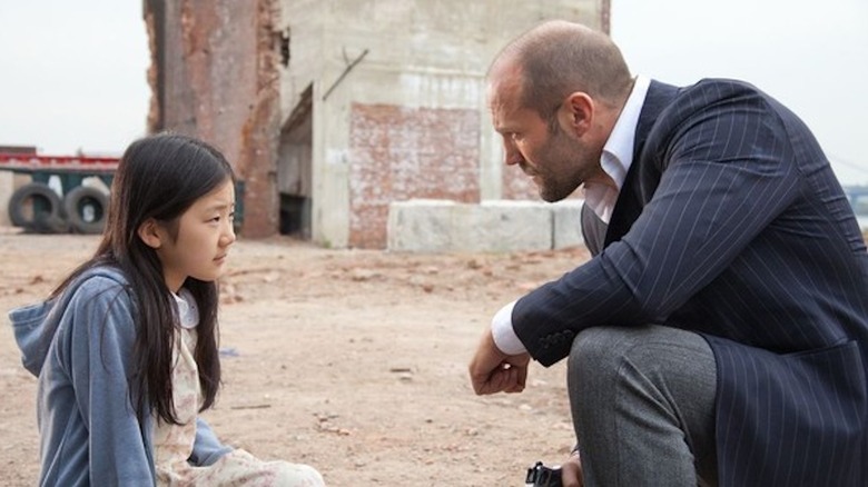 Jason Statham in the role of Luke Wright has a heart to a heart with Catherine Chan as safety in Amen