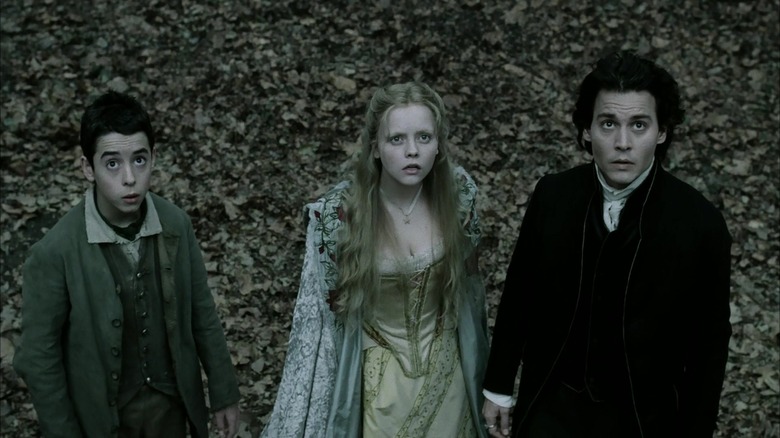 Maspath, Katrina, and Ichabod look on anxiously at Sleepy Hollow
