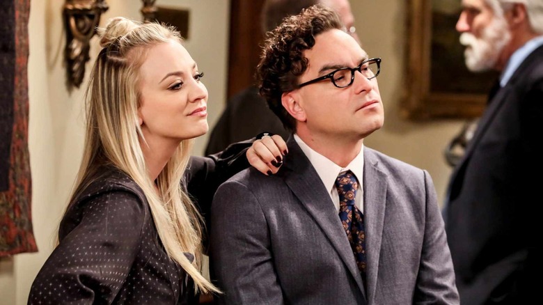 Benny with her hand on Leonard's shoulder on the theory of the big explosion