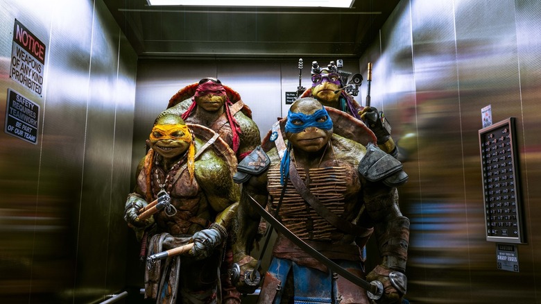 Leo, Mikey, Raph, and Donnie in the elevator in Teenage Mutant Ninja Turtles (2014)