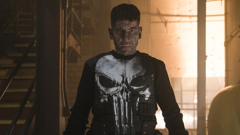 Frank Castle/The Punisher (Jon Bernthal) donning his uniform in 