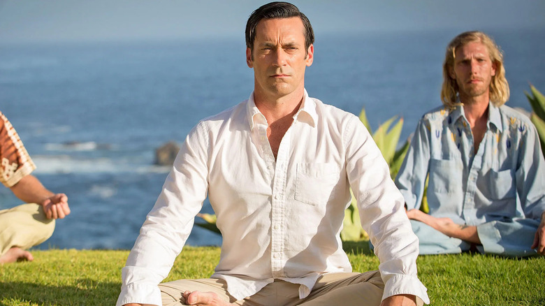 Don sitting at the ashram in a white shirt during the Mad Men series finale