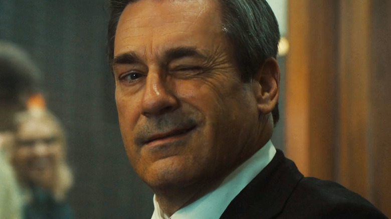 Jon Hamm's Fred Heckman winks in closeup in American Hostage
