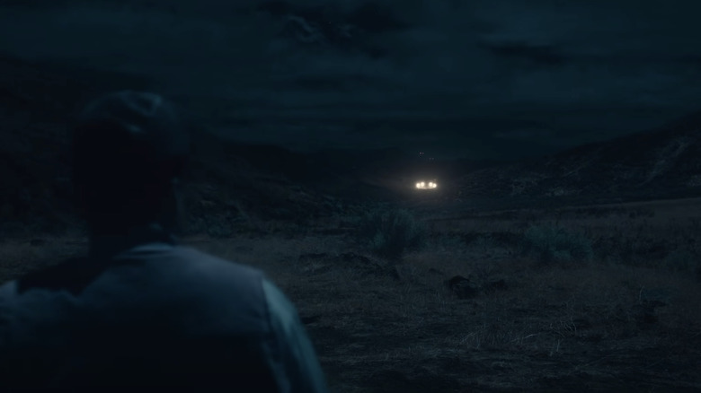 Shining unidentified lights in the distance in Nope