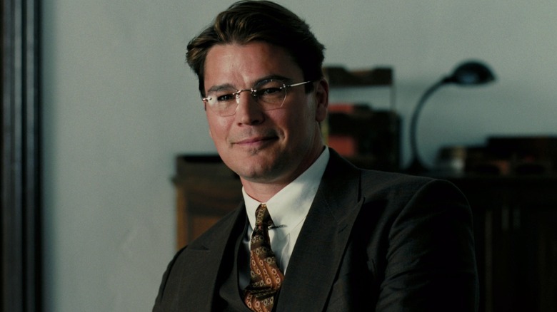 Josh Hartnett as Ernest Lawrence smiling in Oppenheimer