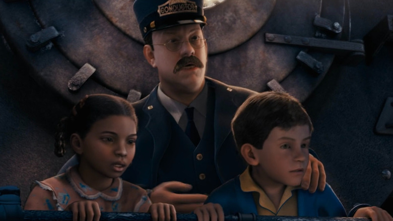 போலார் எக்ஸ்பிரஸில் போலார் எக்ஸ்பிரஸின் முன் ஹீரோ கேர்ள், கண்டக்டர் மற்றும் ஹீரோ பாய்