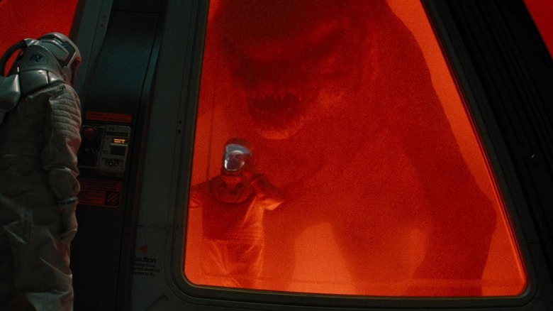 The D-rex getting ready to eat a scientist in Jurassic World Rebirth