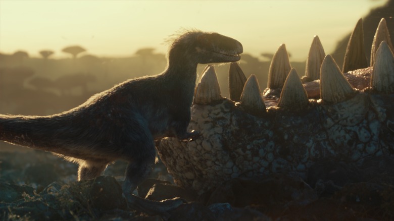 Jurassic World Dominion baby dinosaur cuddle
