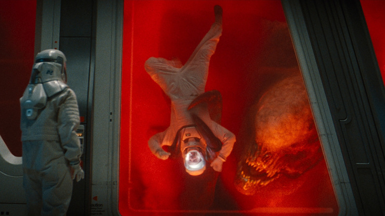 The D-rex getting ready to eat a scientist in the lab in Jurassic World Rebirth