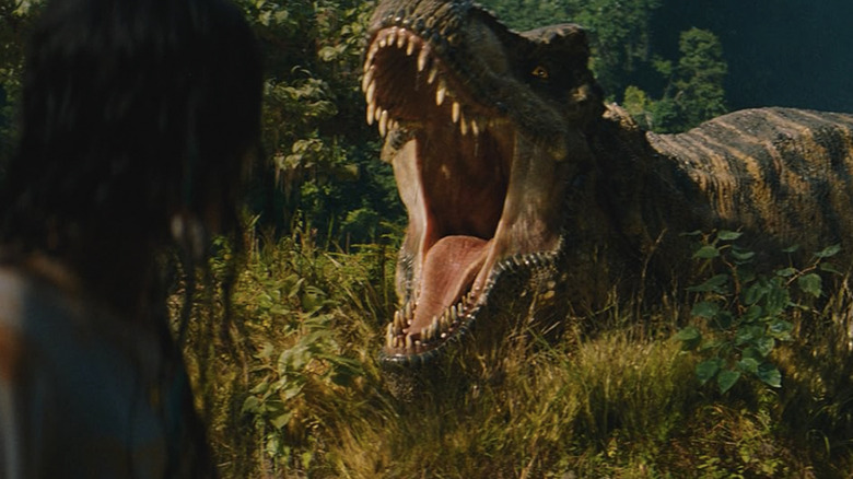 A T-rex stalks a family in Jurassic World Rebirth