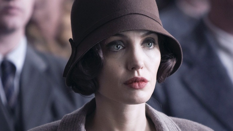 Christine Collins in court in a nice hat and coat in Changeling