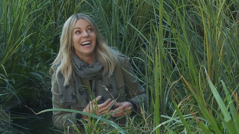Dee grinning wildly in a bog on It's Always Sunny in Philadelphia