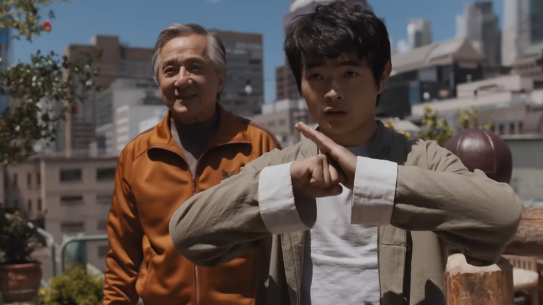 Mr. Han and Li Fong on a rooftop in Karate Kid: Legends