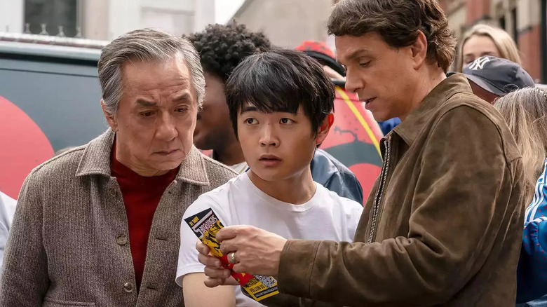 Mr. Han, Li, and Daniel at a kung-fu tourney in Karate Kid: Legends.