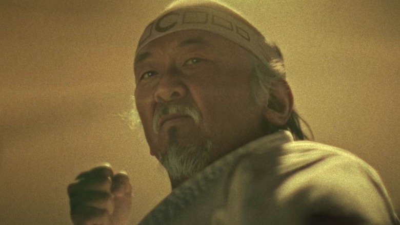 Mr. Miyagi looking down in Cobra Kai