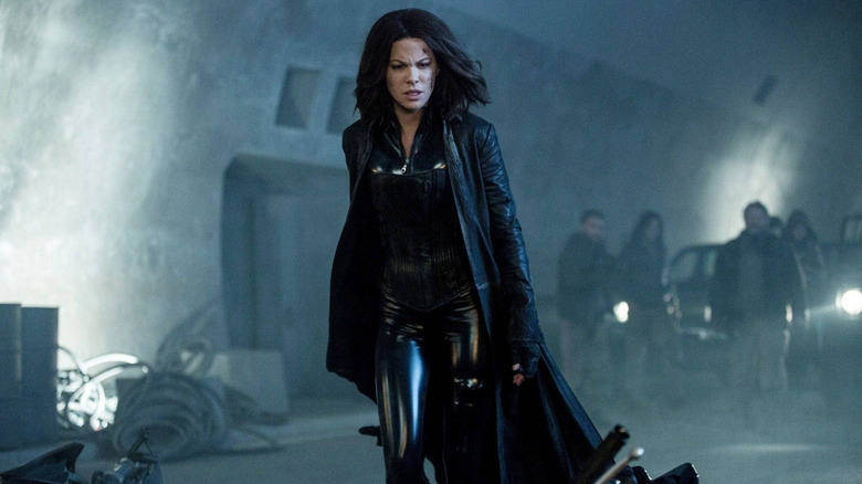 Selene walking up to a motorcycle in Underworld