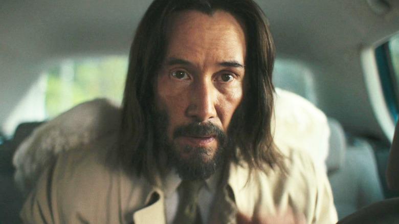 Gabriel looking concerned in the back seat of a car in Good Fortune