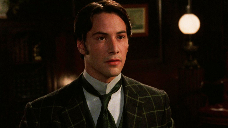 Keanu Reeves' Jonathan Harker sits in an office in Bram Stoker's Dracula