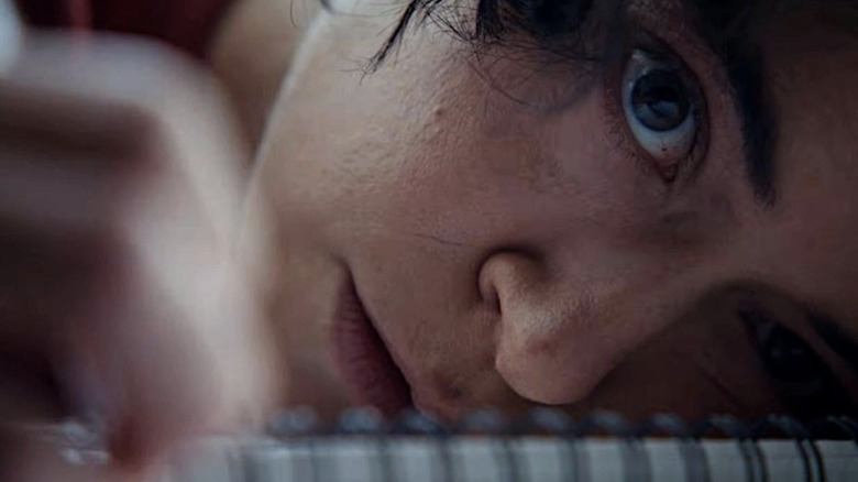 Liz can't stop drawing her nightmares in Keeper