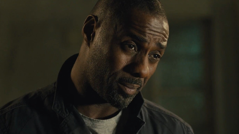 Idris Elba as Sean Briar raising his eyebrows in Bastille Day