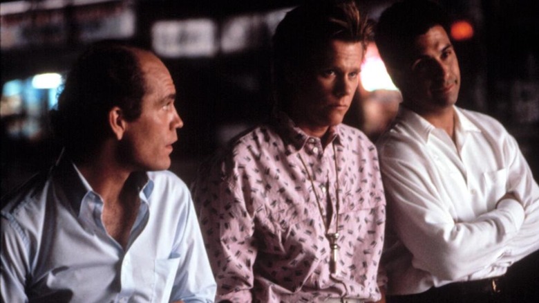 John Malkovich as Eliot, Kevin Bacon as Dennis and Tony Spiridakis as Vinny hang out in a bar in Queens Logic