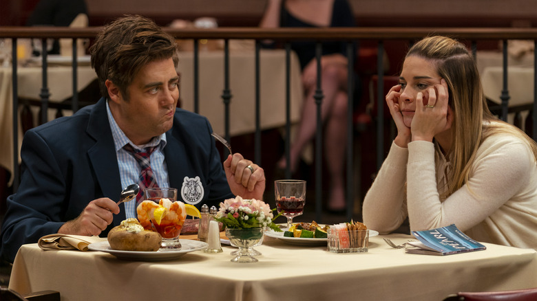 Eric Petersen and Annie Murphy as Kevin and Allison in Kevin Can F*** Himself