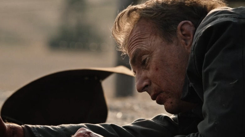 Kevin Costner's John Dutton lays bloodied on the floor in Yellowstone
