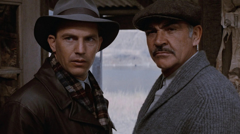 Kevin Costner as Eliot Ness and Sean Connery as Malone want to leave Canada in The Untouchables