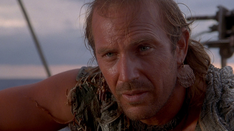 Kevin Costner as The Mariner listening intently in Waterworld
