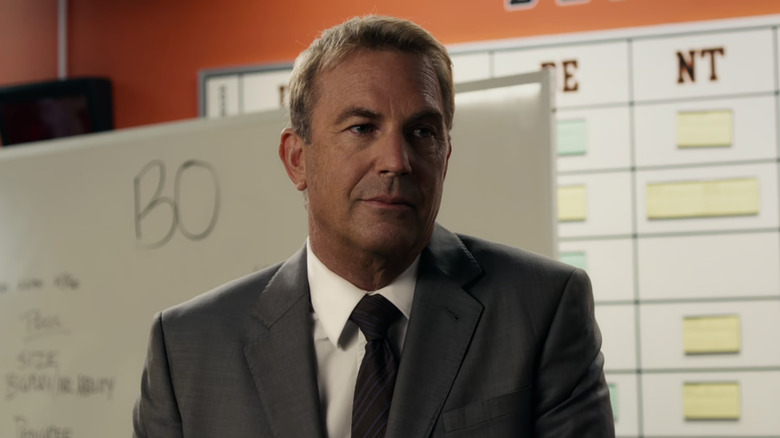 Kevin Costner's Sonny Weaver Jr. sits in an office in Draft Day
