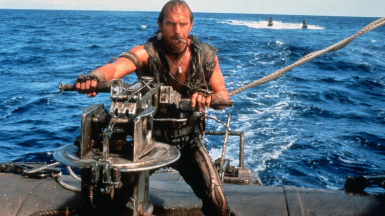The Mariner tries valiantly to steer his ship in Waterworld