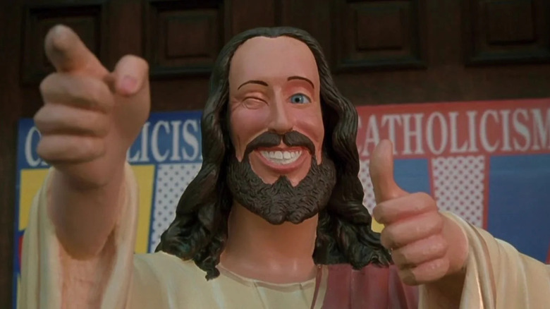 Buddy Christ pointing and smiling in Dogma
