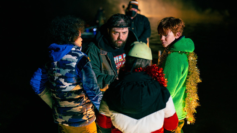 Director Jason Eisener directs his cast on the set of Kids vs. Aliens