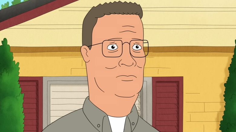 Hank Hill standing in his front yard in King of the Hill season 14