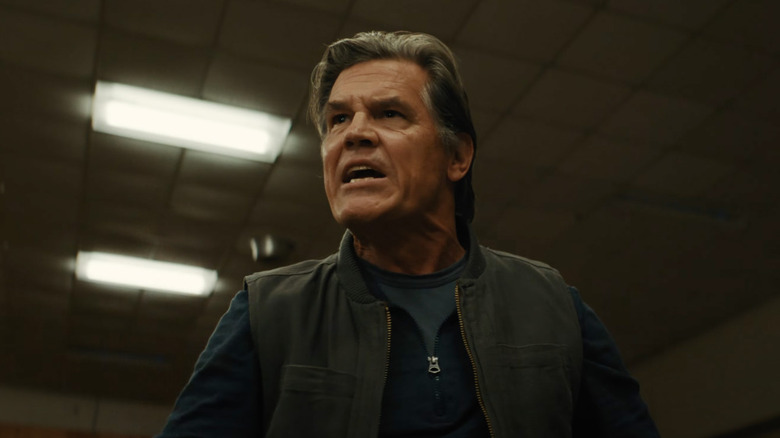 Archer standing up and yelling