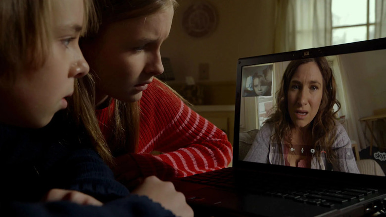 Ed Oxenbould, Olivia DeJonge, and Kathryn Hahn in The Visit