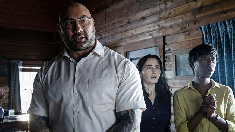 Dave Bautista, Abby Quinn, and Nikki Amuka-Bird in Knock at the Cabin