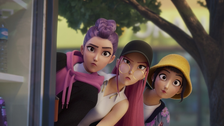 Rumi, Mira, and Zoey peeking around a corner in KPop Demon Hunters