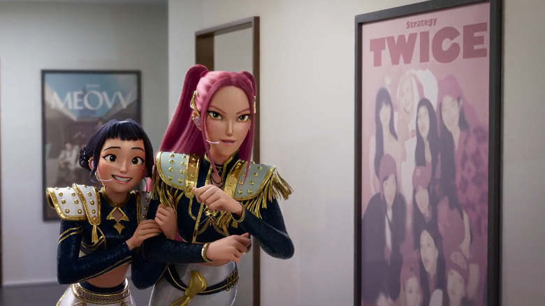 Zoey and Mira enthusiastically run through a hallway in KPop Demon Hunters
