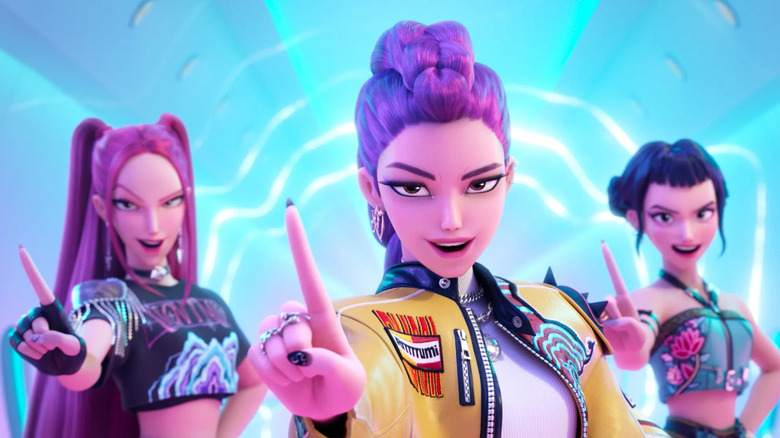 The members of HUNTR/X do a no gesture and smirk in KPop Demon Hunters