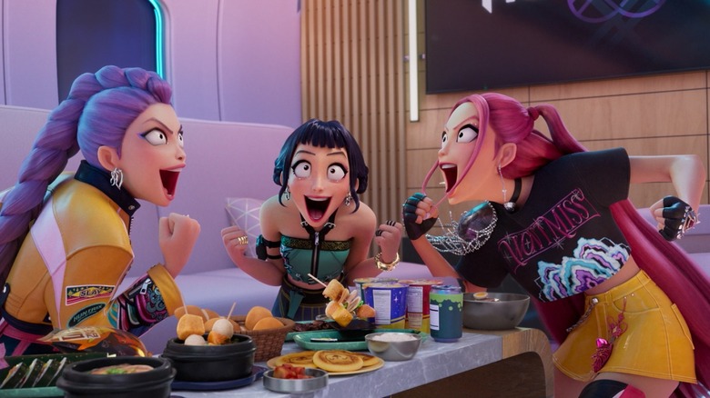 The members of HUNTR/X shout in excitement at the sight of food in KPop Demon Hunters