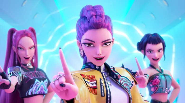 The members of HUNTR/X do a no gesture and smirk in KPop Demon Hunters